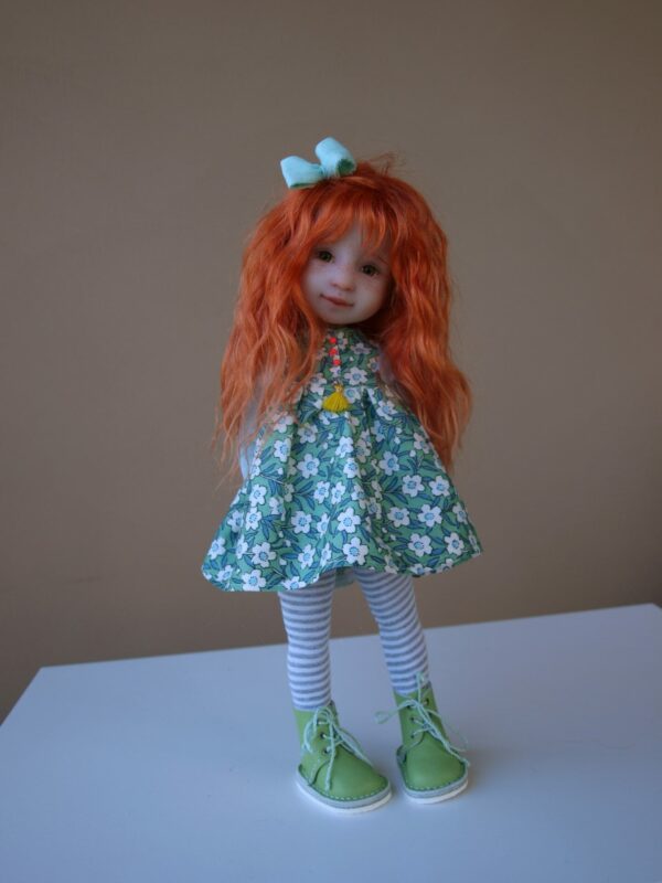 ruby red doll blue bow red hair green shoes